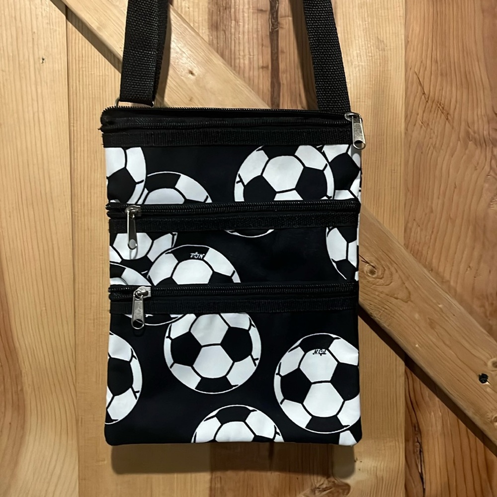 N.Gil Soccer messenger crossbody bag with adjustable strap has 3 pockets